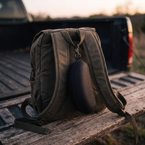 HaloBeam Storage Case clipped to a backpack strap